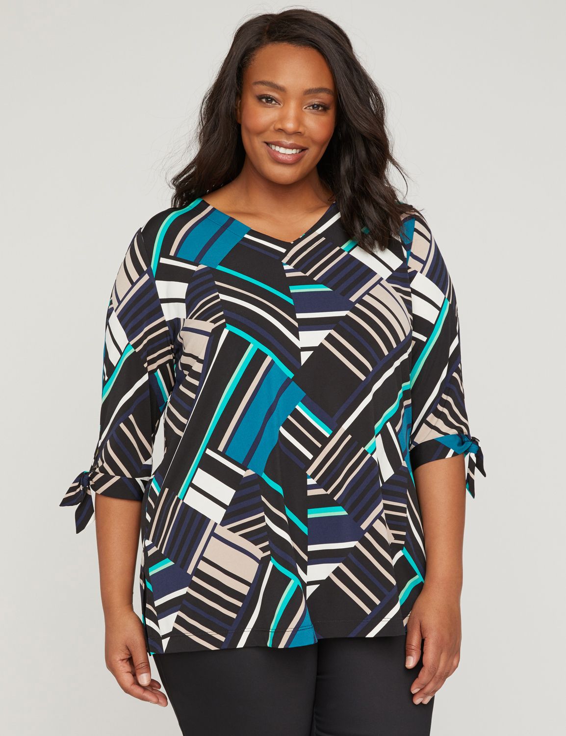 Lightweight and breezy, this tunic offers a perfect dose of casual comfort. V-neck. Three-quarter sleeves with tie design at cuffs. Split side hem. The longer tunic length pairs perfectly with our Capri Jegging. Item Number #314946, 96% Polyester/4% Spandex, Machine Wash, Imported Plus Size Top, Length: 31.25", Petite Length: 29.25" , Plus Sizes 0X-5X, Petite Plus Sizes 0XWP-3XWP, Catherines Plus Sizes