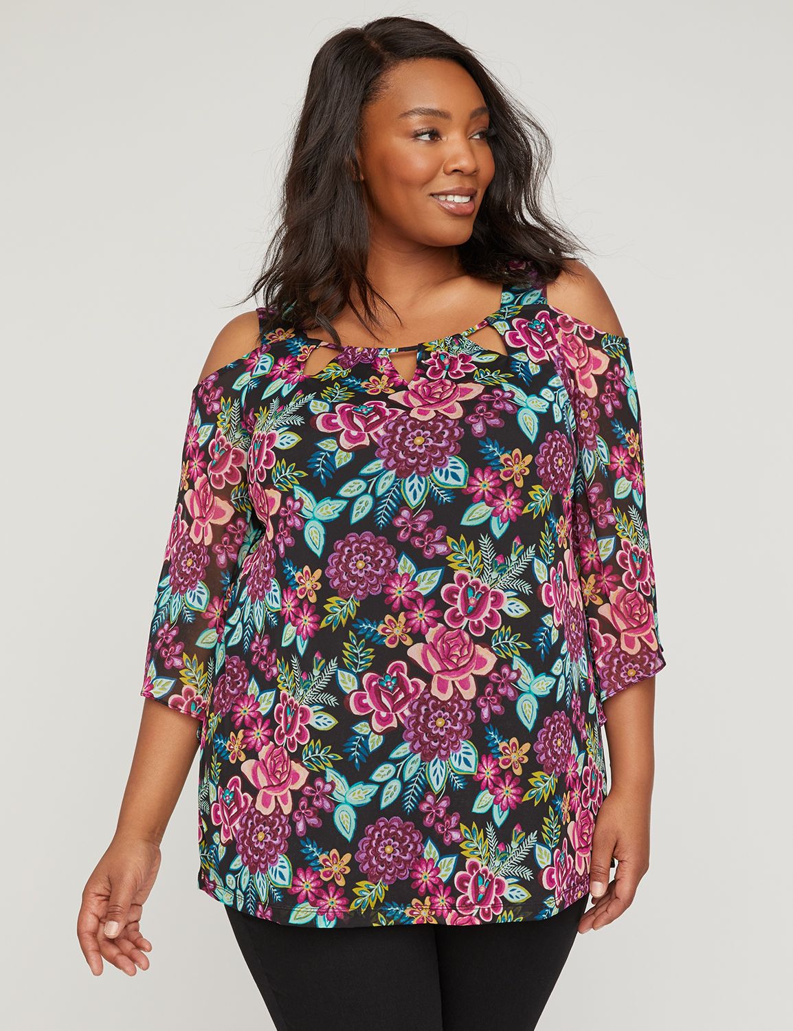 A cold-shoulder top with a feminine, sheer overlay creating a soft, whimsical design. Cutout details along the scoop neck. Covered elastic along back neckline. Lined body. Three-quarter, sheer sleeves with slits at cuffs. Item Number #315082, 100% Polyester, Machine Wash, Imported Plus Size Top, Length: 30", Petite Length: 28" , Plus Sizes 0X-5X, Petite Plus Sizes 0XWP-3XWP, Catherines Plus Sizes