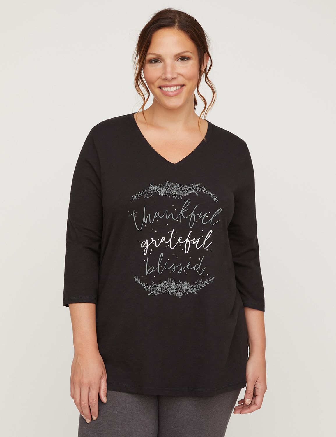 On-the-go comfort! An active top in slub Cotton with a graphic embellished with metallic and sparkle. V-neck. Three-quarter sleeves. Item Number #316070, 50% Cotton/50% Polyester Slub Jersey, Machine Wash, Imported Plus Size Activewear, Length: 30" , Plus Sizes 0X-5X, Petite Plus Sizes 0XWP-3XWP, Catherines Plus Sizes