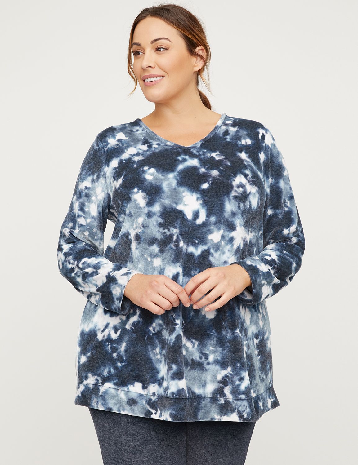 An easy-to-wear top that offers ultimate comfort and style. Featuring a tie-dye print in super-soft, super-cozy velour. Double V-neck with crisscross straps at the back. Long sleeves. Longer length for added coverage and comfort. Banded edge at cuffs and hem. Item Number #316076, 61% Polyester/39% Rayon, Machine Wash, Imported Plus Size Activewear, Length: 30" , Petite Length: 28" , Plus Sizes 0X-5X, Petite Plus Sizes 0XWP-3XWP, Catherines Plus Sizes